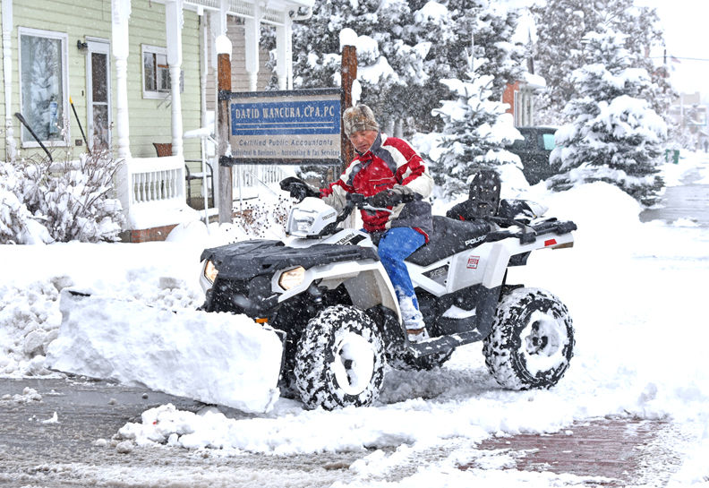 Clearing snow in Salida